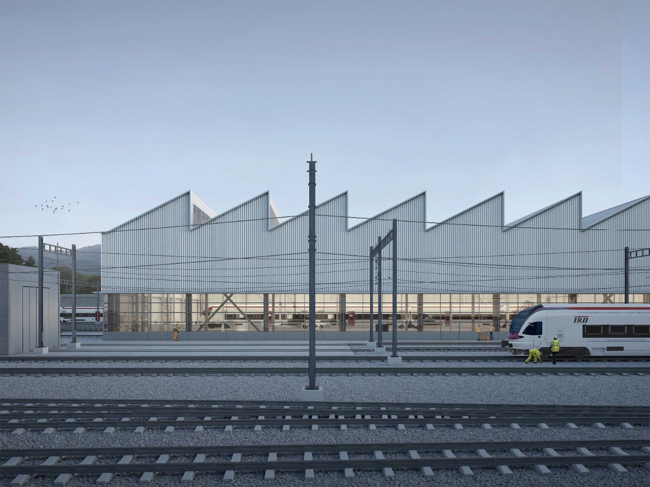 Visualizzazione della facciata esterna lato est, con i binari di transito e le ampie finestre che danno luce all’impianto di produzione.